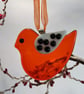 Orange Fused Glass Bird with Spotted Wing - Image 1