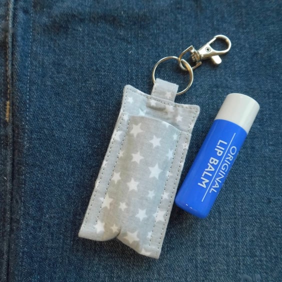 Key ring lip balm holder in grey and white star print fabric