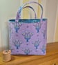 Fabric gift bag: floral display on lilac - Image 1