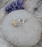 Cream Lampwork Glass and Silver Circle Necklace - Image 4