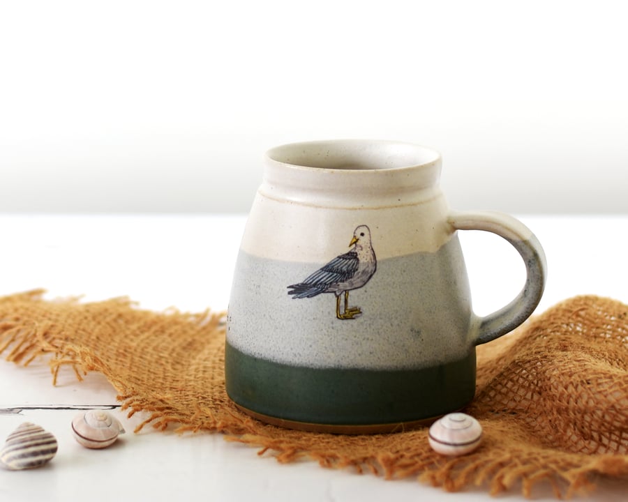 Handmade coastal ceramic seagull mug, green and white pottery