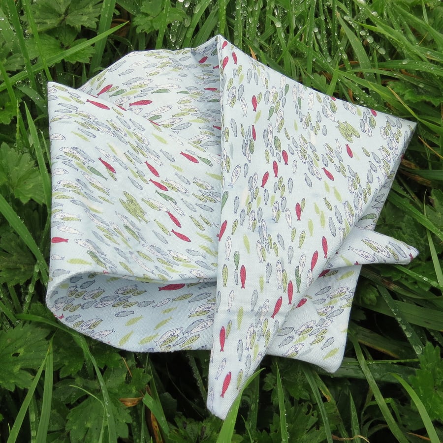 A dog bandana.  Size small.  56cm x 20cm. Fish design.