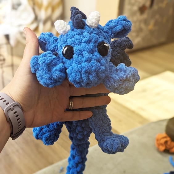 Plush crocheted dragon lovey, soft cuddly toy