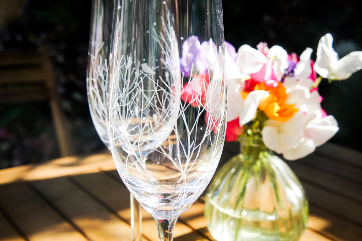 A Pair Of Hand Engraved Champagne Dartington Crystal Flutes Woodland
