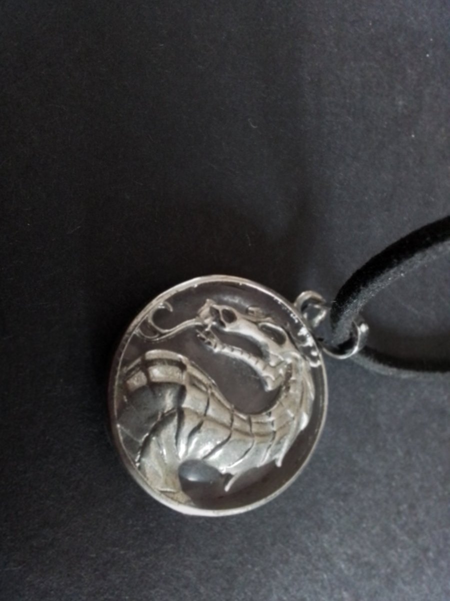 Image of Rose quartz pendant. Dragon. Ref 511