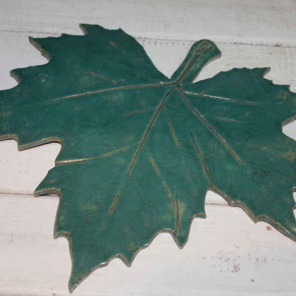 Handmade ceramic leaf decoration