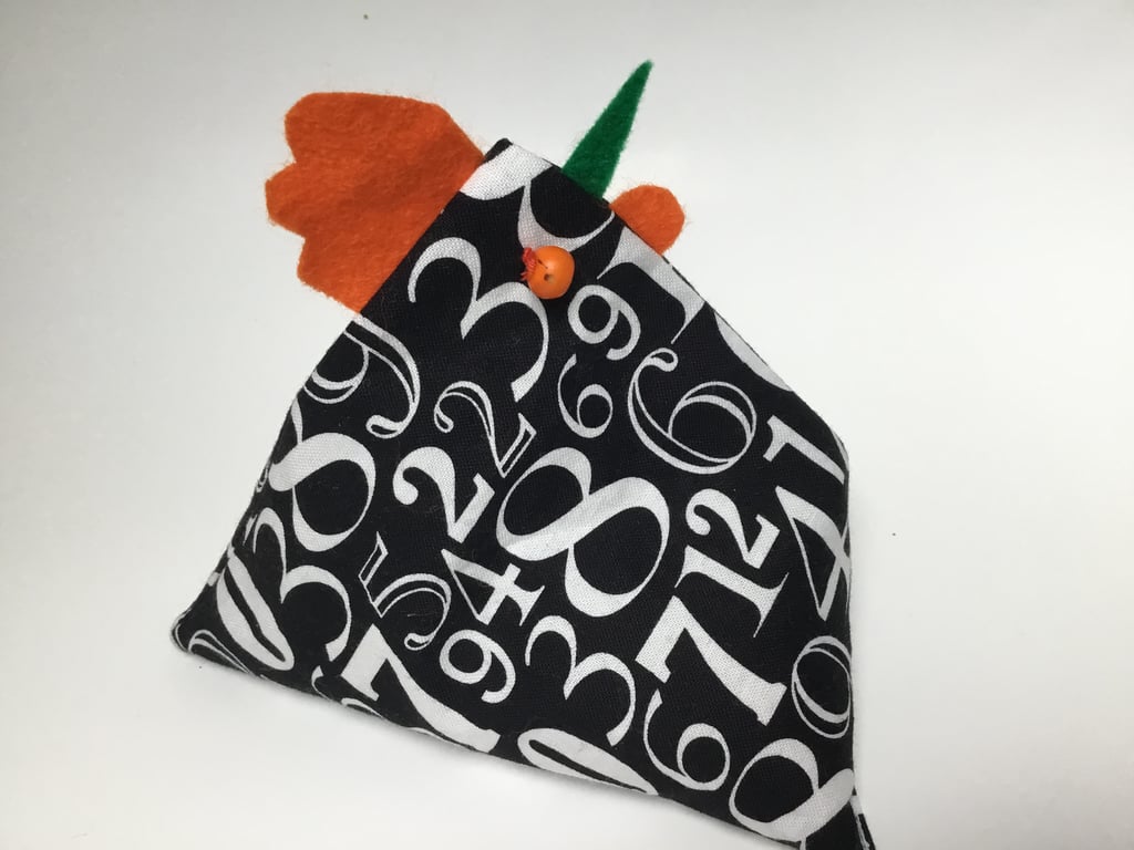 Paper weights. Three chicken bean bag weights in black and green