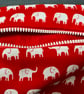 Small funky zipped pouch with white elephants on scarlet red background