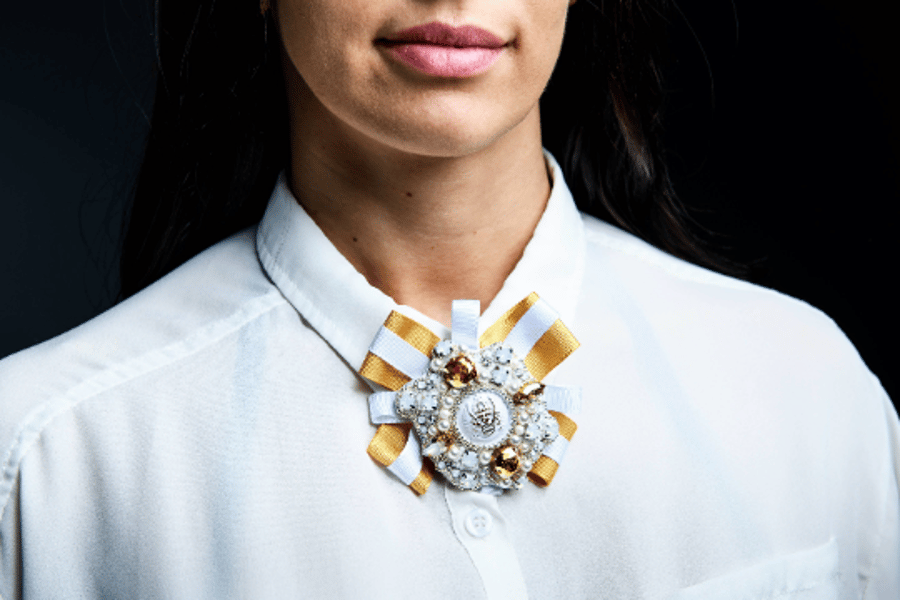 Swarovski crystal embellished beaded white and gold ribbon collar badge brooch