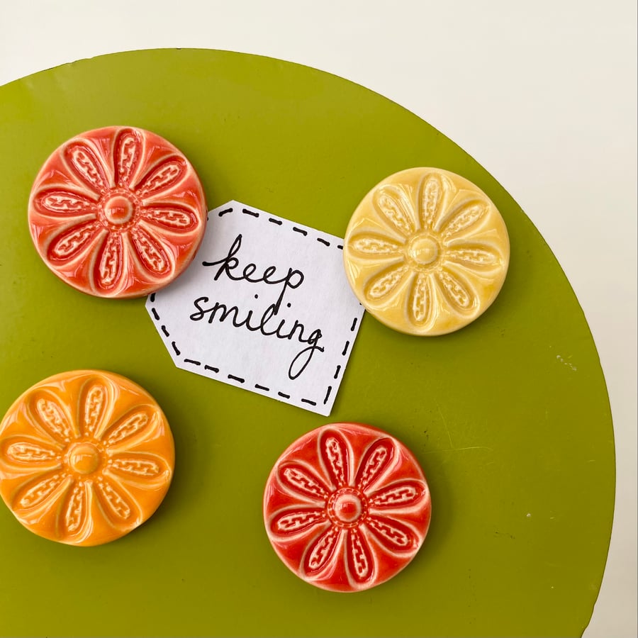 Set of four ceramic flower magnets