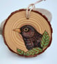 Blackbird pyrography log slice decoration