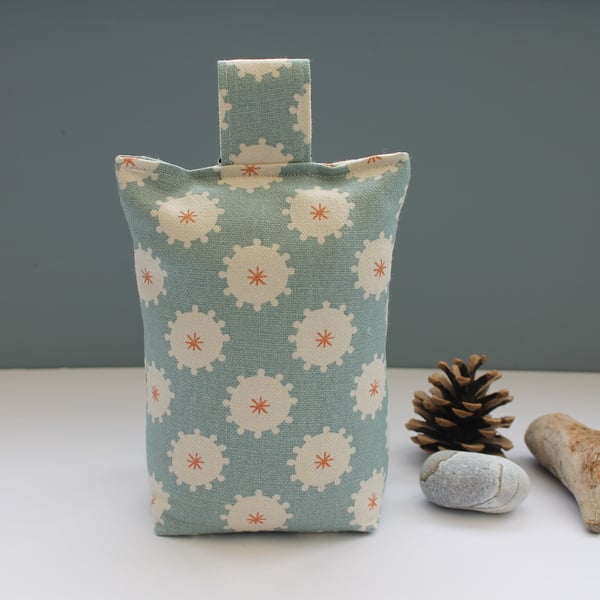 Blue doorstop. Vanessa Arbuthnott May Blossom smoke light peach blue door stop.