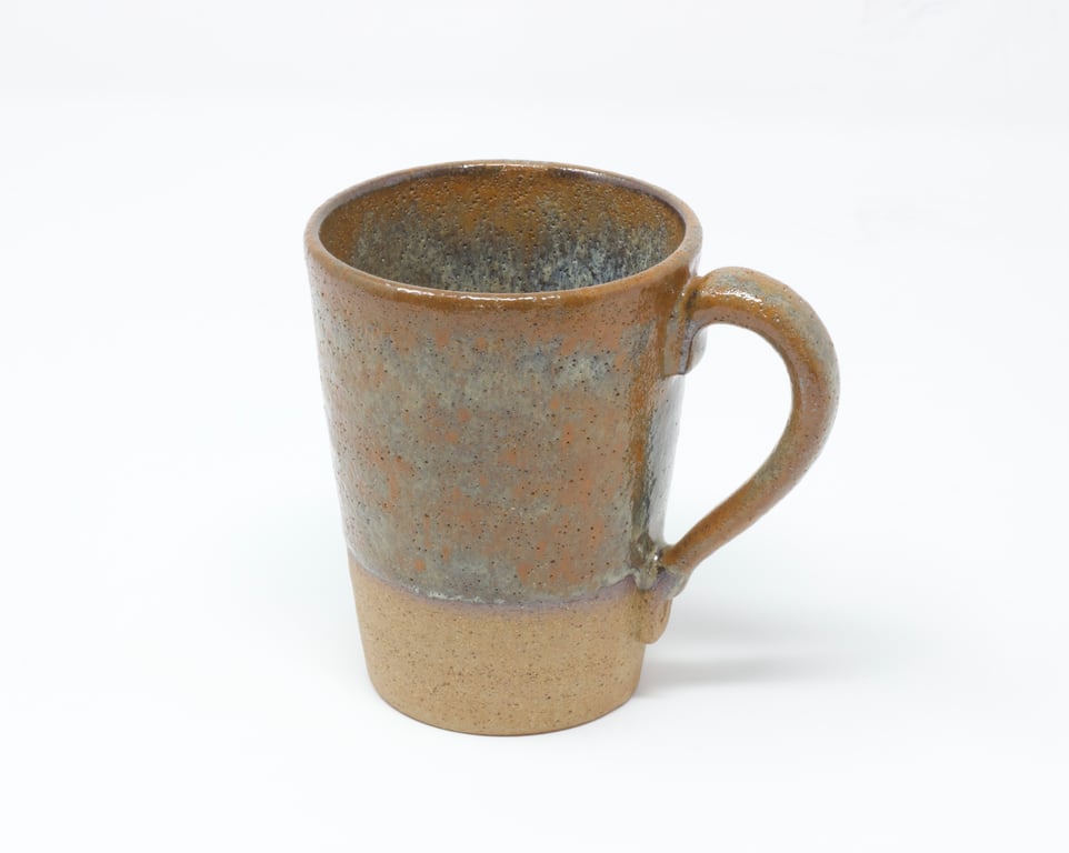 Rusty brown textured clay cup