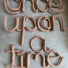 Once upon a time. Brown wired wall sign 