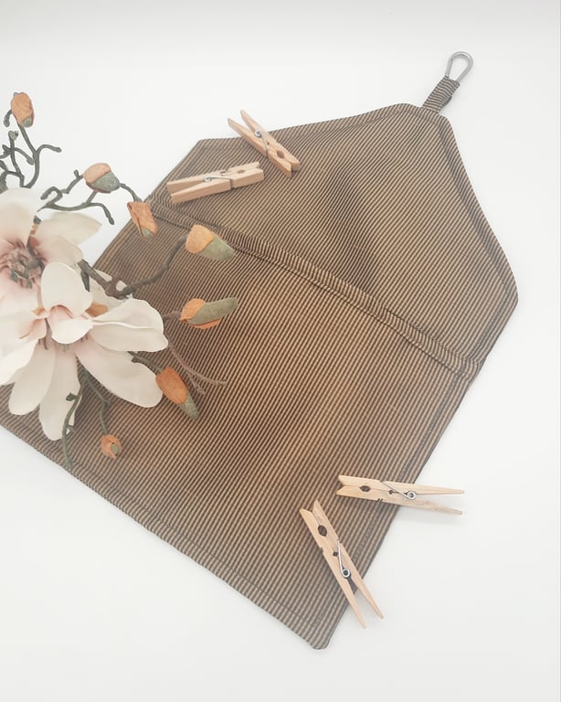 Black and gold vertical stripe clip on peg bag.