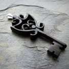 Carved Ebony Key Pendant, silver