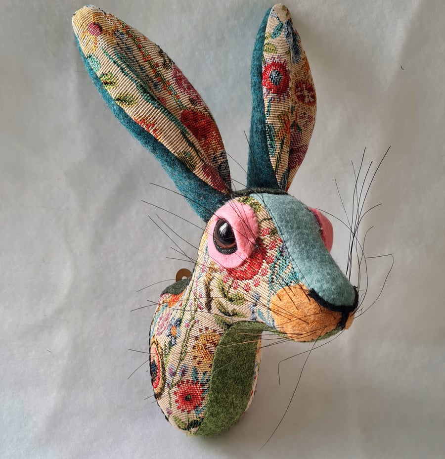 Faux hare head wall mount in floral tapestry fabric