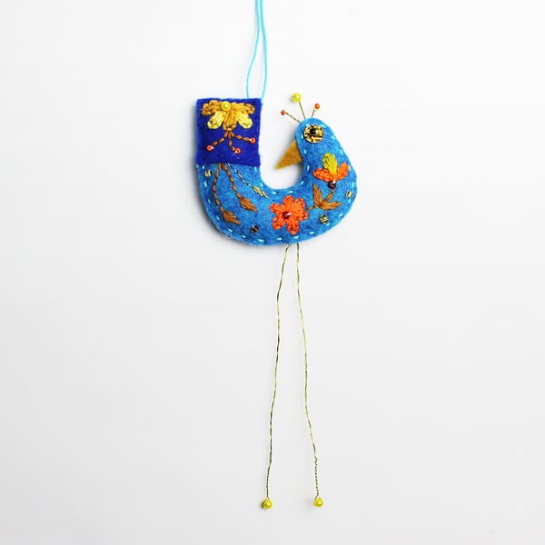 Icy blue coloured felt hanging bird ornament with folk embroidery