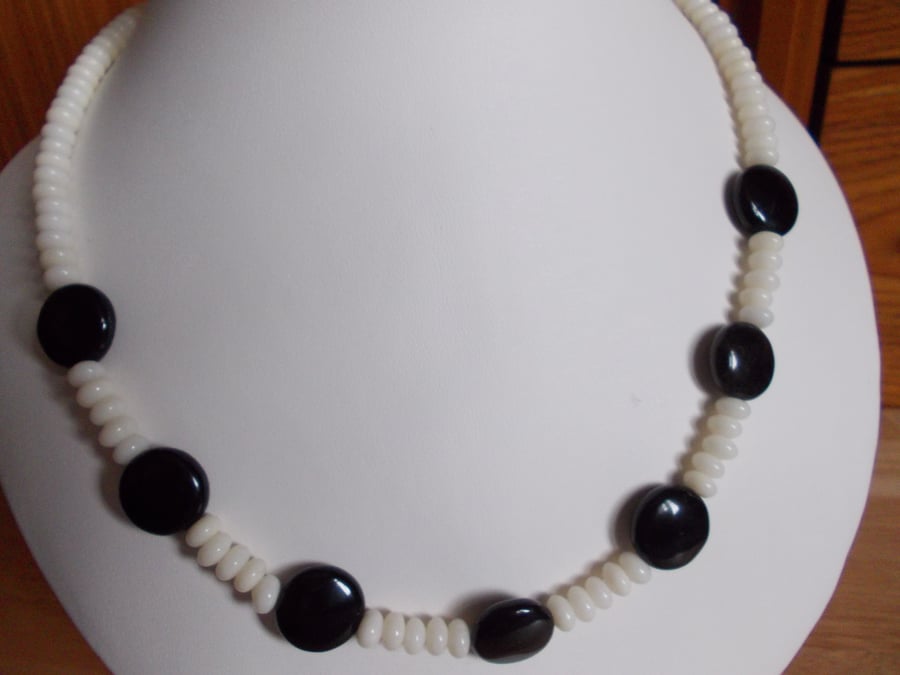 Obsidian coins and coral necklace
