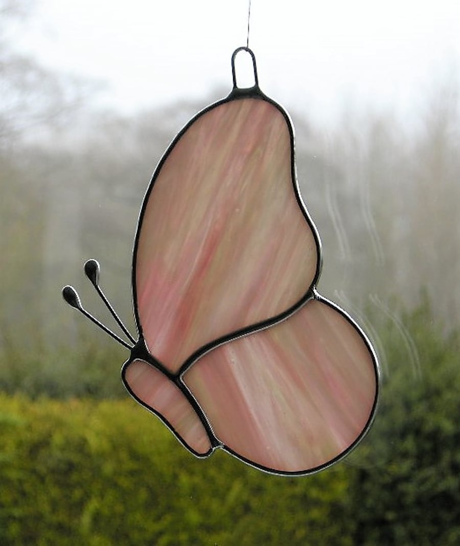 Stained Glass suncatcher Butterfly in pink, green and white streaky glass