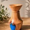 Handturned Lacewood bud vase with blue resin infill