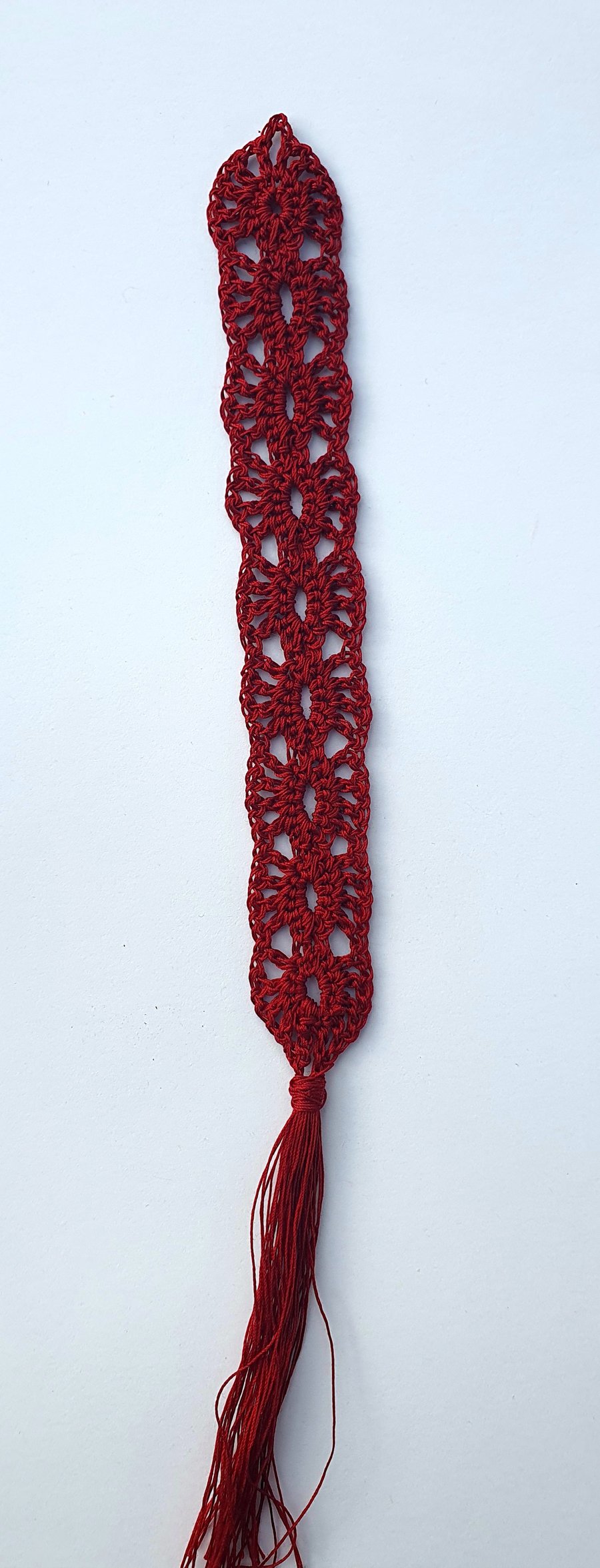 Crocheted lace bookmark, dark red.