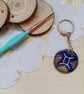Wooden circular starsign gemini keyring - Image 1