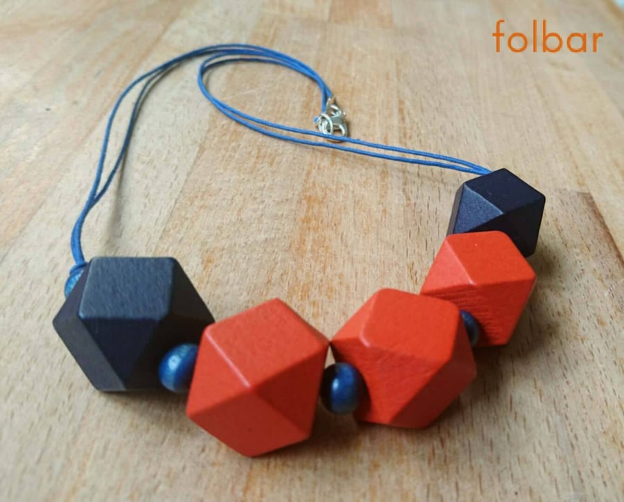Chunky geometric wooden necklace in orange and navy