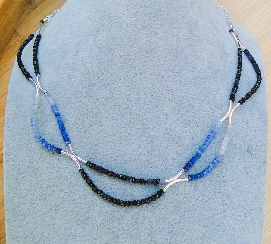 Sparkly blue sapphire gemstone necklace with sterling silver tubes and clasp  