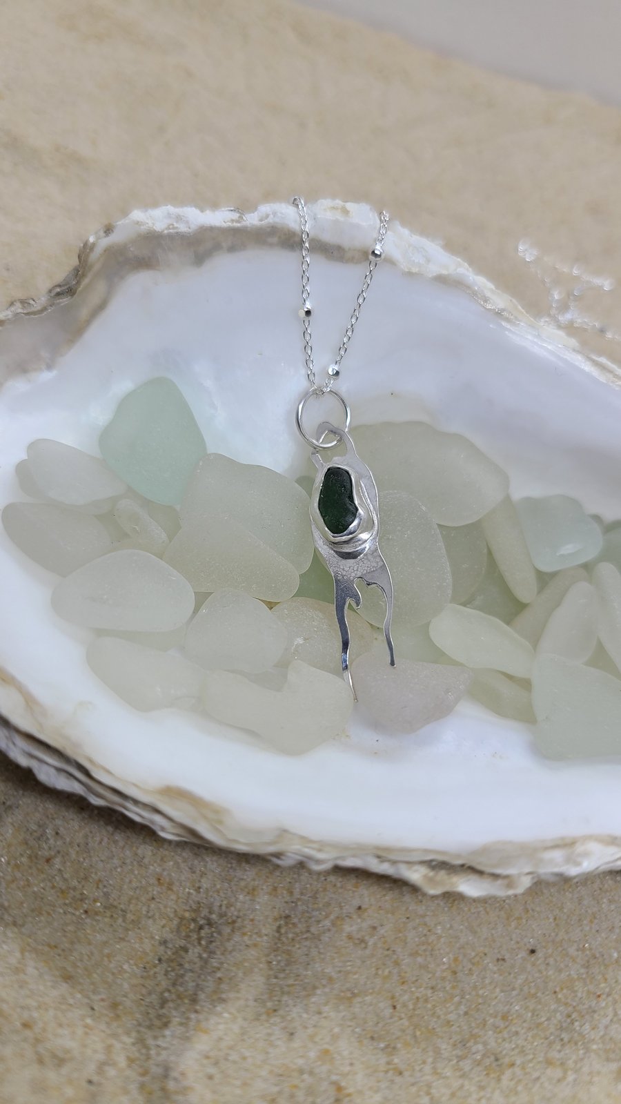 Dark forest green sea glass and silver mermaids purse skate case pendant P14