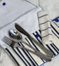 Travel cutlery roll with cutlery. Blue with dogs, spots and stripes