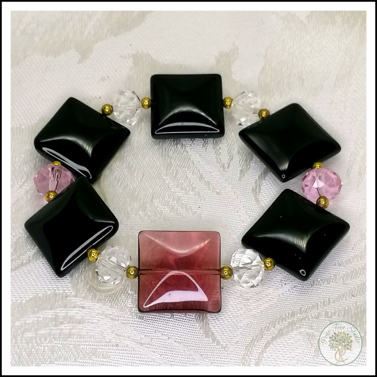 Bracelet with square flat glass beads, purple, black and clear crystal beads.