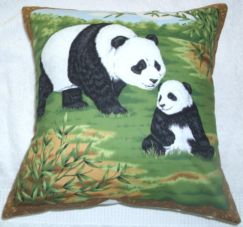 Panda and Cub in a clearing cushion