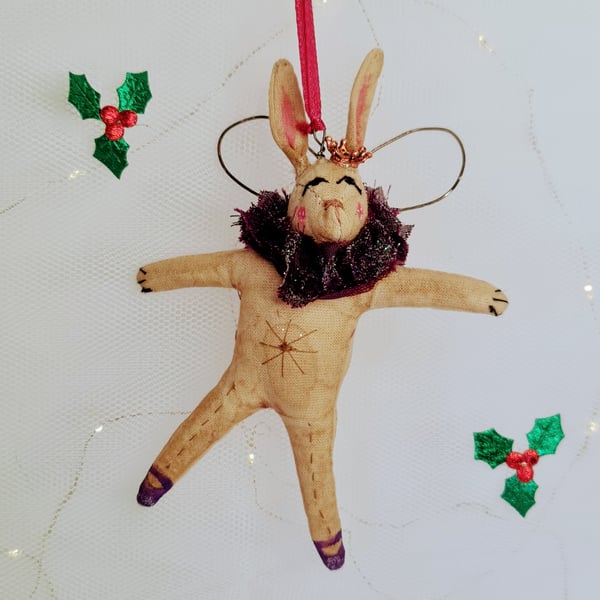 Handmade primitive hare with wire angel wings