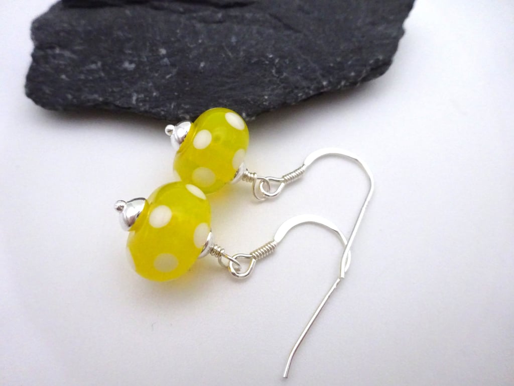 yellow and white polka dot lampwork glass earrings