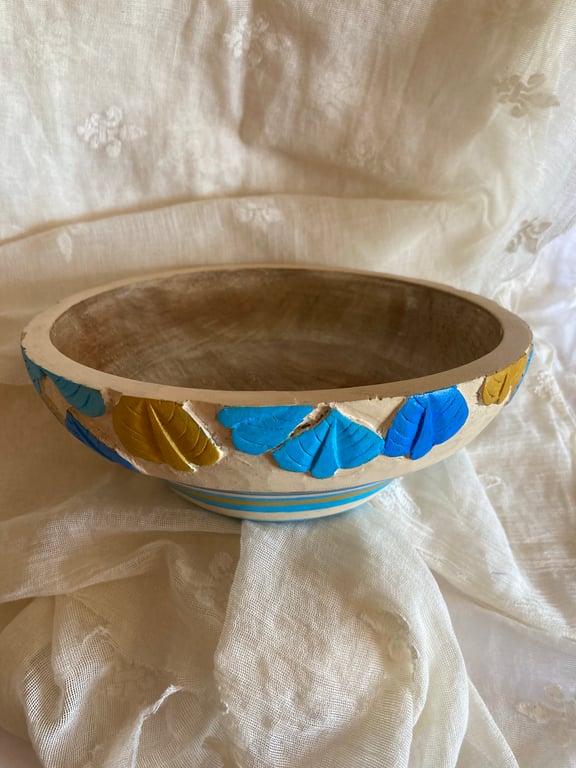 Upcycled wooden bowl with leaves