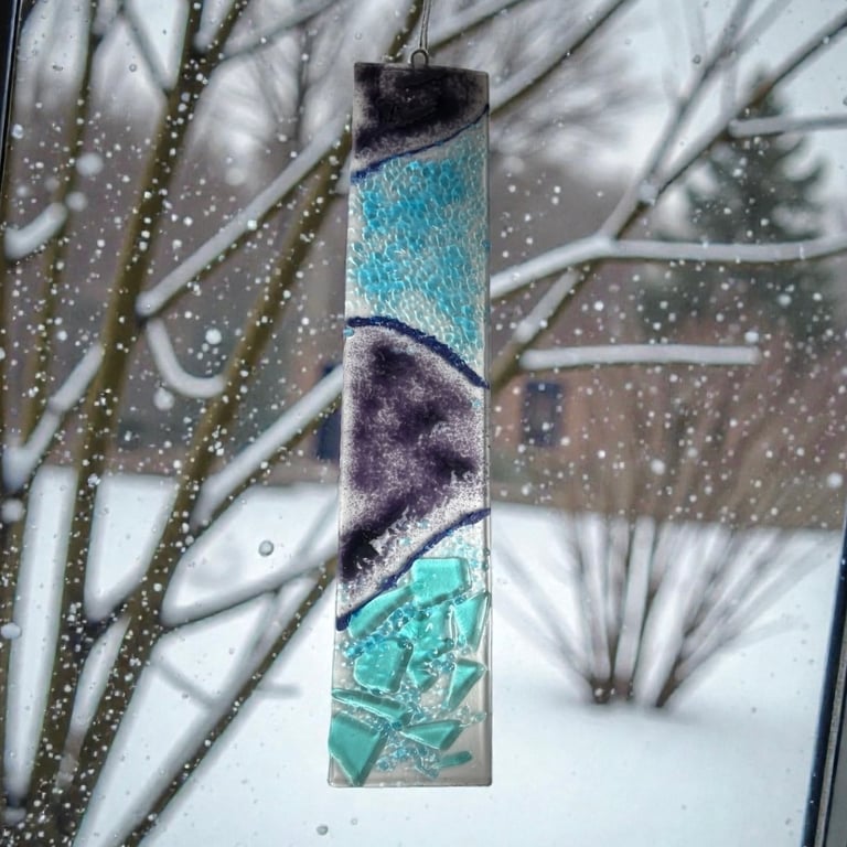 Handmade and unique fused glass sun catcher.