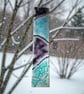 Handmade and unique fused glass sun catcher.