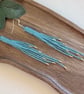 Shimmering aqua blue beadwork tassel fringe earrings - Image 1