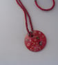 Red Glass Pendant on Red and Black Braided Rope - Image 2
