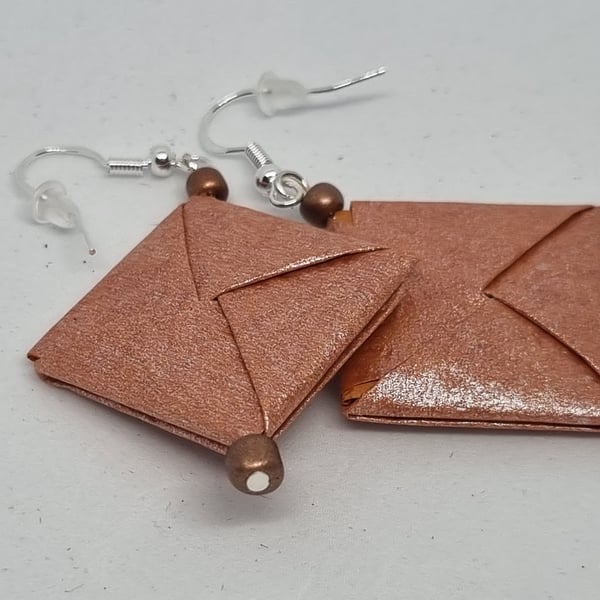 Handmade origami earrings: toffee-coloured pearlescent paper and small beads 
