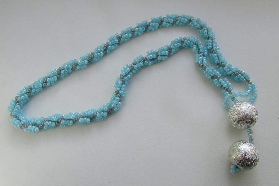 Pale Blue Spiral Necklace
