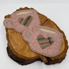 Set of two woollen mug rugs