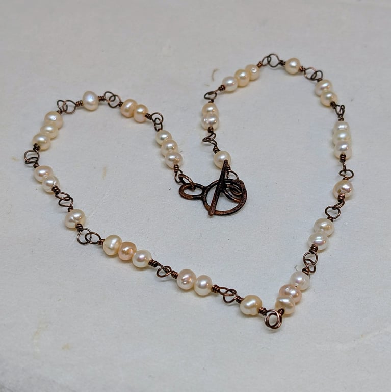 Pearl and copper wirework necklace with toggle clasp, June birthstone 