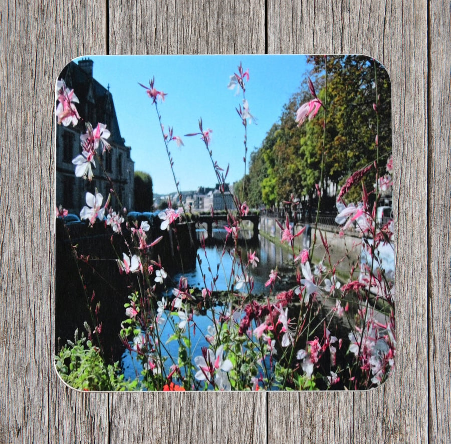 Coasters. Gaura flowers on a bridge in Quimper, Brittany. Photo image cork 