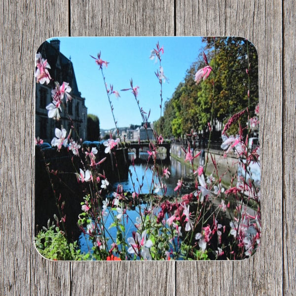 Coasters. Gaura flowers on a bridge in Quimper, Brittany. Photo image cork 