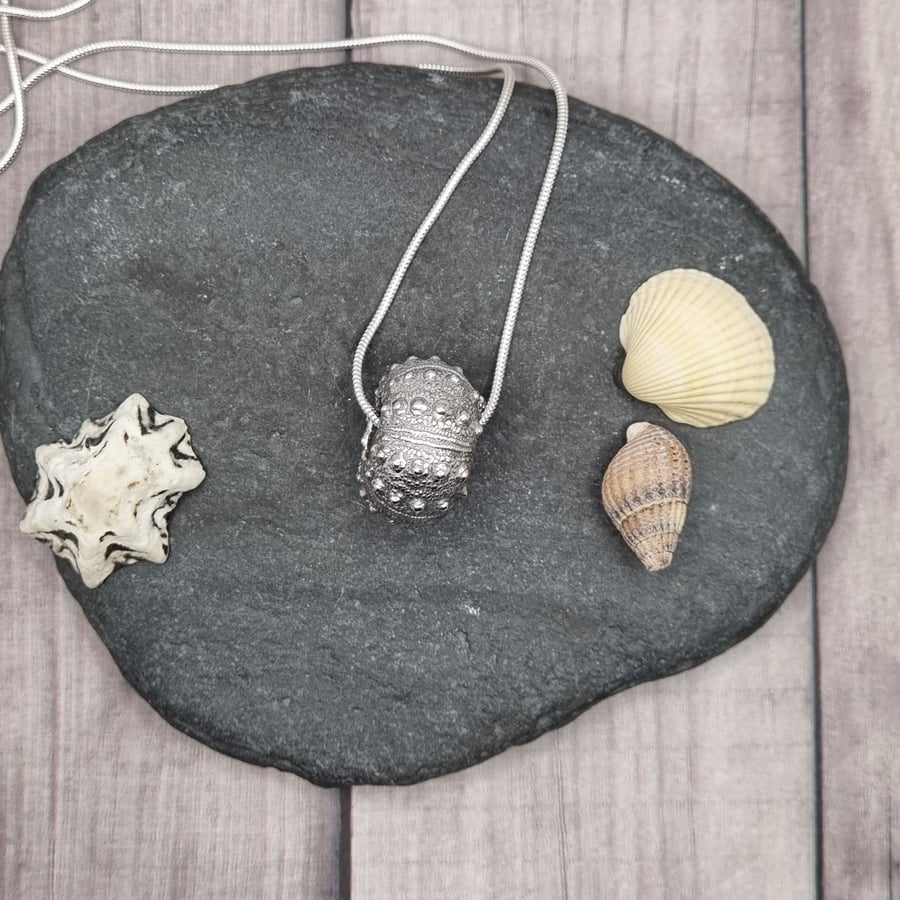 Real sea urchin shell preserved in silver, pendant necklace