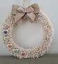Teddy bear yarn wrapped wreath