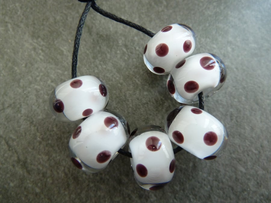white encased black spot lampwork glass beads