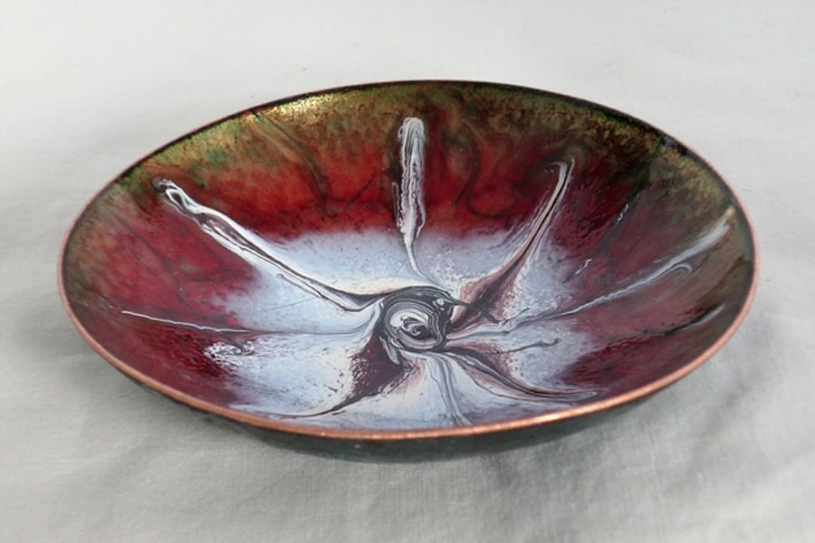 dish scrolled white and blue-grey over red